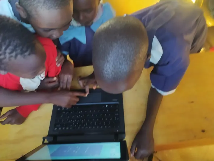 School Electrification Programme students at a solar-powered classroom in Kenya